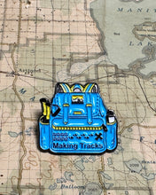 Making Tracks Backpack Pin