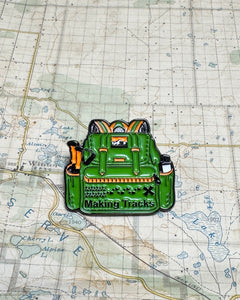 Making Tracks Backpack Pin